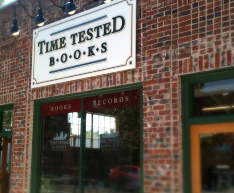 Time Tested Books sign