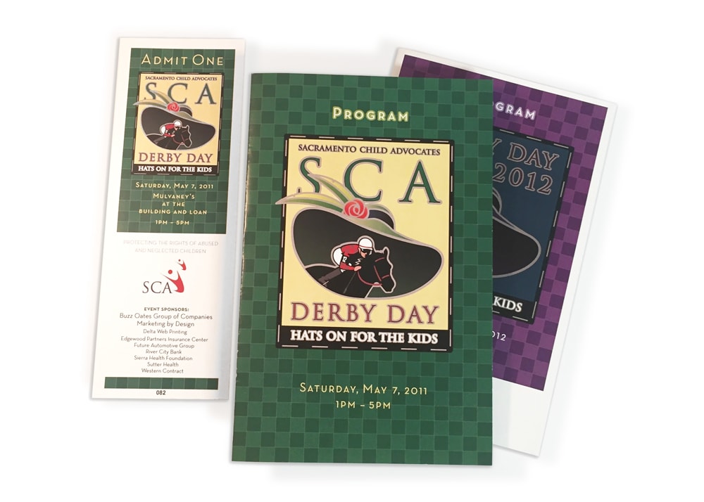 An admission ticket and the front covers of two different programs for SCA Derby Day.